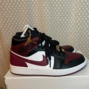 Jordan retro 1 mid womens size 8 with charms.